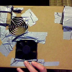 Heres a front view, my laptop sits ontop of here. The blocks in the top corner let the laptop sit at an angle, so it can get more air circulation.