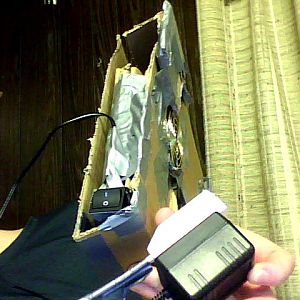 Heres a sideview. It shows my 12v DC powerpack, and the smaller black thing in the corner of the box is a double rocker switch.