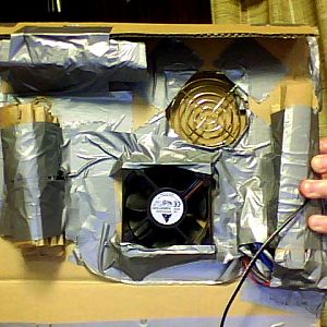 Heres the inside, nothin much just a bunch of taped down crap. LOL