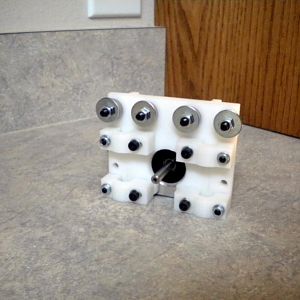 The large mudguard/fender washers function as guides for the belt that will be running over the bearings (under the washers)