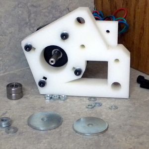 The bearings and washers function as a guide for the belt