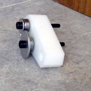 Notice how the bearings are sandwiched between smaller washers as well