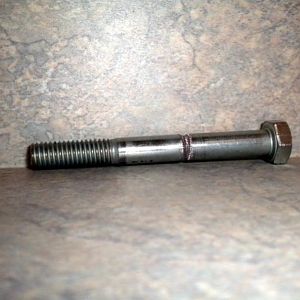 I ground a small channel into a M8 bolt and then used my tap to add the markings that will grip and advance the print material.