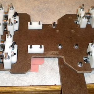 Completed Y-axis carriage.  The small rectangular blocks will be used to hold the carriage to the drive belt.  The small protruding piece of material