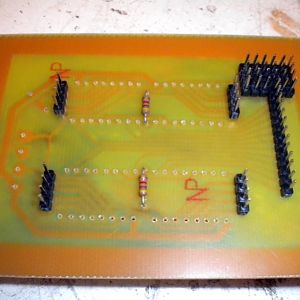 The strip of pins down the right side are the enable/step/direction control lines for each driver chip.