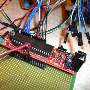I used a scrap piece of protoboard to build a jumper-board for the Atmega.