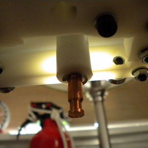 The extruder has been bolted into place, the snap ring provides surface for my tension plate so the copper tip doesn't get forced out of the Teflon ba