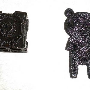 Weighted companion cube, and some small teddy bear.