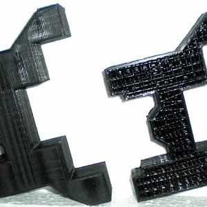 I decided the little retention tabs on the bottom were worthless, so I ground them off.  You can also see the internal support structure on the right