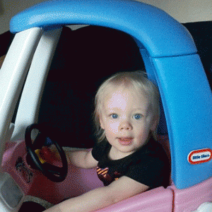 Lucy already loves cars!