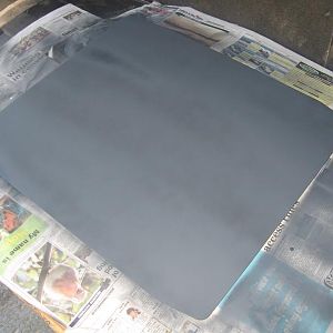 After sanding down and cleaning, I begin to spray the primer.