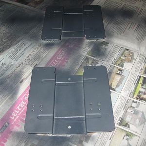 These are part of the HDD cage, so they also get primered.