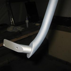 One of the handle bars being primered.