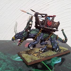 My customised Stegadon with a champion mounted.