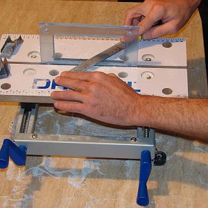 filing off the rough cuts, sanding off the file marks and then sanding off the sanding marks (simples)