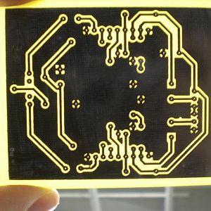 After a bath in acid the etches are visually inspected for shorts.