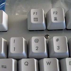 Second of the two screws to remove.