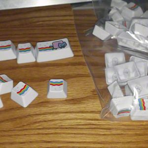 Three sets of Nyan Cat Cherry MX keys.