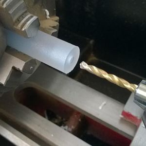Drilling out the acrylic tube