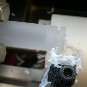 Parting off the acrylic disks