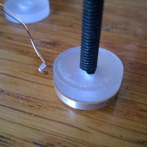 The acrylic disk gapped to accommodate the LED