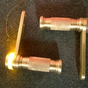 Power and Reset levers, one lit