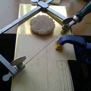 Tools of the trade: piercing saw, wax, bench peg