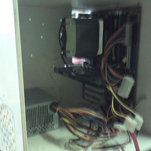 From the other side, the mobo and PSU in place