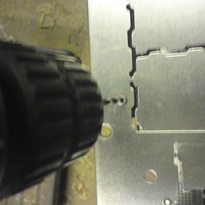 Drilling out the rivets