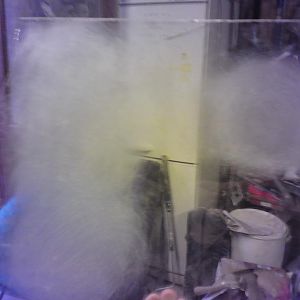 Testing the frosting on discarded piece