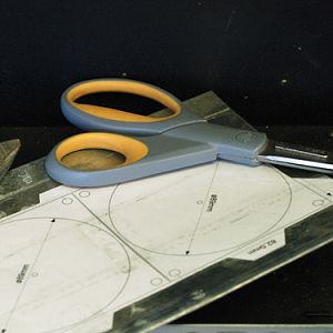 Glued on to the sheet metal