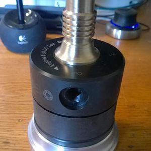 Pump cover with holder and fitting