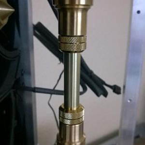 Brass tube fitted: the res --> pump connection.