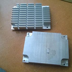 Tops of the stock heat sink and heat pipe block