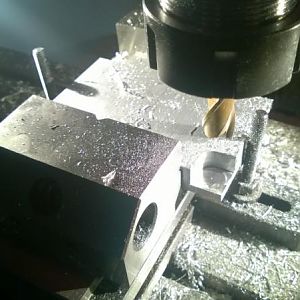 Milling the pockets in the bottom block half