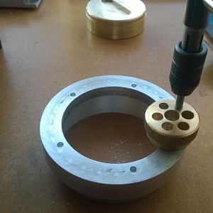 Drilled and tapped the holes.