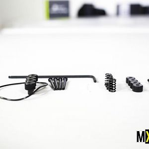 Sealant, springs, different sized screws, and an alan key