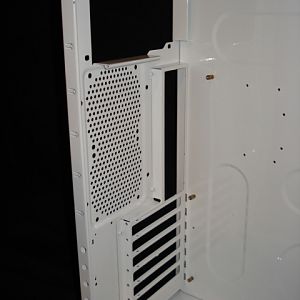 The rear of the chassis with the Power Supply mounting area motherboard tray erea, exhaust fan mounting area and PCI card fixing area.