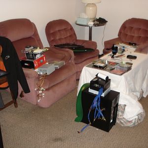 My flat is pretty much a workshop now lol:) The green and black Computer i am currently building for a guy i know here, it was an old Windows 98 machi