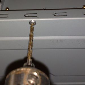 5 4 Drilling the rivets to remove the mobo tray