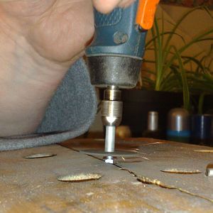 5 13 Cutting down the screws for the feet