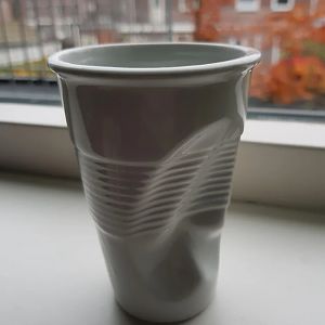 ceramic cup that looks like a disposable plastic one